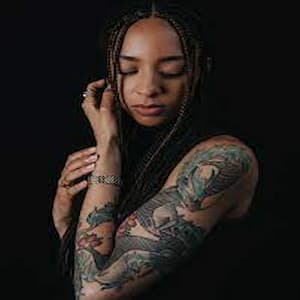 Amala Ekpunobi Tattoo